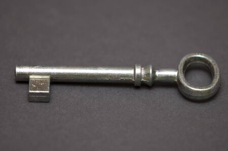 metal key on dark backgroundの写真素材