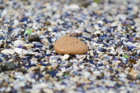 detail of pebble on sand beachの写真素材