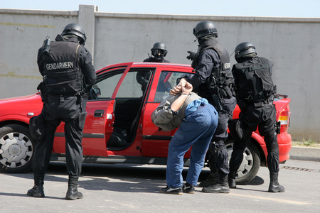 Police squad catch terrorists with car during exercise in the city of Sofia, Bulgaria  sep, 11,2007. Crime scene. Criminals.のeditorial素材
