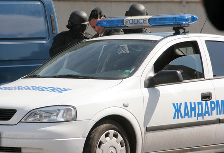 Police squad catch terrorists with car during exercise in the city of Sofia, Bulgaria  sep, 11,2007. Crime scene. Criminals.のeditorial素材