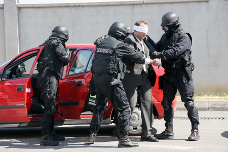 Police squad save kidnapped man tied with handcuffs in the city of Sofia, Bulgaria  sep, 11,2007. Crime scene. Criminals. Terrorists.のeditorial素材