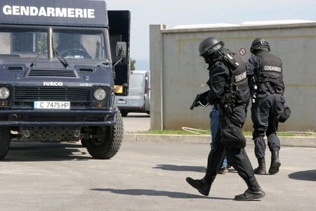 Police squad catch terrorists with car during exercise in the city of Sofia, Bulgaria  sep, 11,2007. Crime scene. Criminals.のeditorial素材
