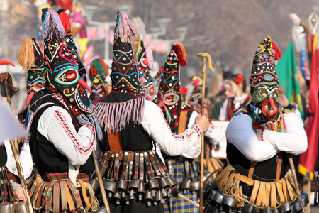 Kukeri , mummers perform rituals intended to scare away evil spirits during the international festival  of masquerade games Surva in Pernik, Bulgaria  Jan27,2018. Mummers walk and dance with costumes and big huge bells.のeditorial素材