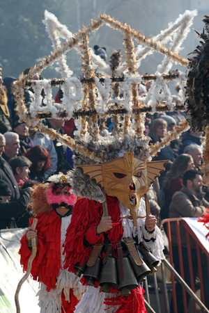Kukeri , mummers perform rituals intended to scare away evil spirits during the international festival  of masquerade games Surva in Pernik, Bulgaria  Jan27,2018. Mummers walk and dance with costumes and big huge bells.のeditorial素材
