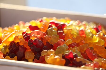 Gummy candies. Jelly candies. Gummy bears or worms. Mix of gummy candies. Jelly candies background....