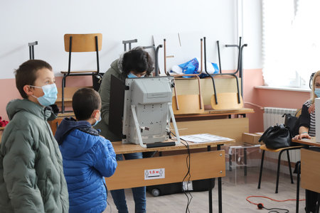 Polls are opening for voting for Bulgaria's third parliamentary election this year and 2 in 1 elections for President in Sofia, Bulgaria on NOV 14, 2021のeditorial素材