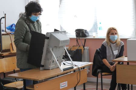 Polls are opening for voting for Bulgaria's third parliamentary election this year and 2 in 1 elections for President in Sofia, Bulgaria on NOV 14, 2021のeditorial素材