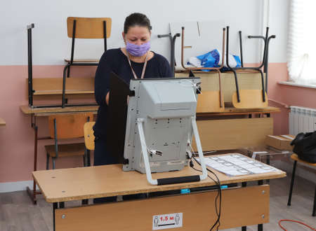 Polls are opening for voting for Bulgaria's third parliamentary election this year and 2 in 1 elections for President in Sofia, Bulgaria on NOV 14, 2021の写真素材