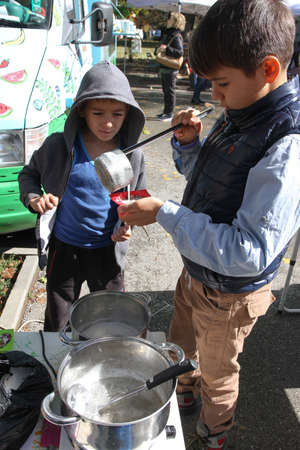 Kids are making handmade natural soaps with essential oils and wild flowers in Sofia, Bulgaria on Oct 07, 2017のeditorial素材