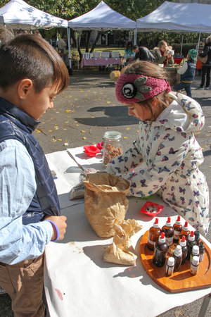 Kids are making handmade natural soaps with essential oils and wild flowers in Sofia, Bulgaria on Oct 07, 2017のeditorial素材