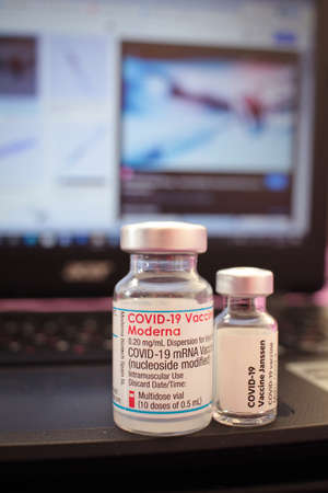 Sofia, Bulgaria â NOV 22, 2021: Vials of Moderna and Janssen Vaccines for coronavirus cure, vaccine for Covid -19 pandemic at the corona vaccination centres worldwideのeditorial素材
