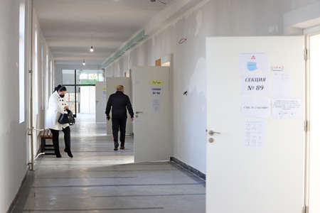 Single people on election day in empty polling stations voting for President in Sofia, Bulgaria on NOV 21, 2021のeditorial素材