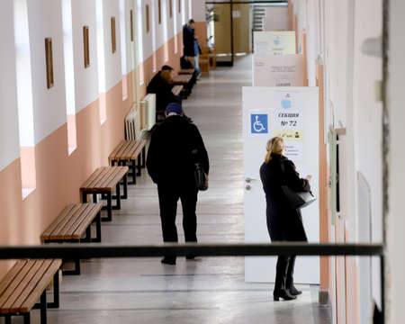 Single people on election day in empty polling stations voting for President in Sofia, Bulgaria on NOV 21, 2021のeditorial素材