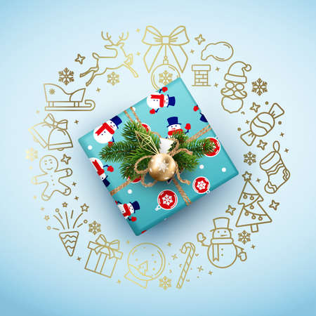 Christmas card with a blue box and a wreath of Christmas symbolsのイラスト素材