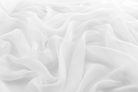 abstract background luxury cloth or liquid wave or wavy folds of grunge silk textureの写真素材