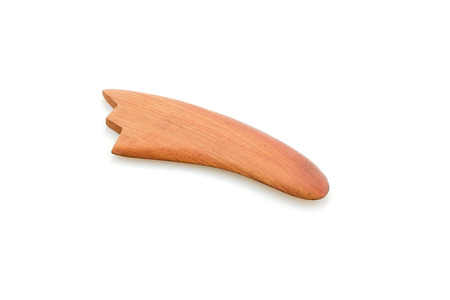 Wooden hand-massager. Accessories for massage  white background.の写真素材