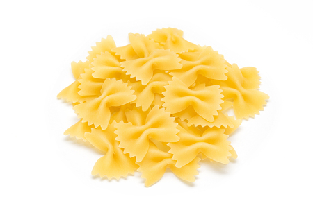 Pasta farfalle close-up,  copy space white backgroundの写真素材