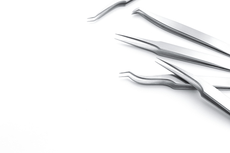 blank template set metal tweezers for artificial or fake eyelashes for your design, copy space, white background.の写真素材