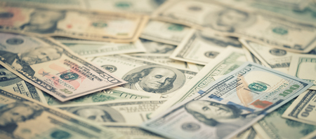 Wallpaper closeup series American money  5,10, 20, 50, new 100 dollar bill. Macro background pile US...