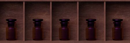 Five reagent bottles placed on a laboratory shelf