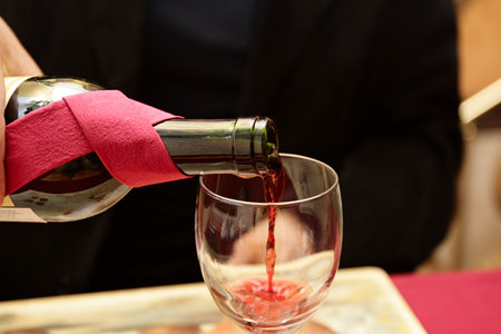 The men fills red wine in restaurant