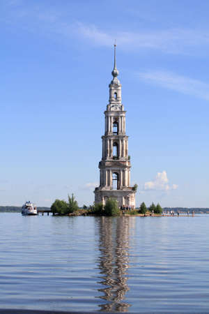 The bell tower among water in summerの写真素材