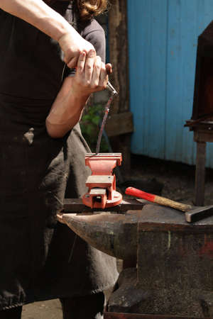 The blacksmith at works in summer, outdoor