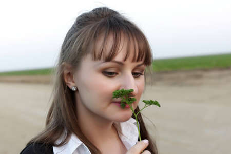 Portrait of girl with the parsley, Californiaの写真素材