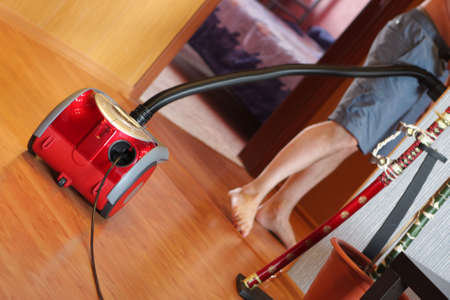The vacuum cleaner when in use at homeの写真素材