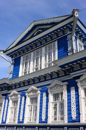 Blue decorated wooden house in Nizhni Novgorod, Russiaの写真素材