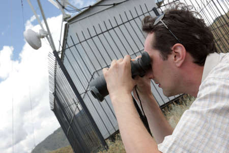 The planner of radio relay link works on telecom site