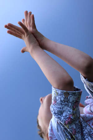 The girl reaches for the sky, Russiaの写真素材