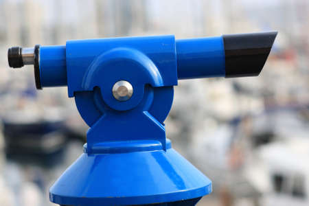 The blue paid telescope in city at summerの写真素材