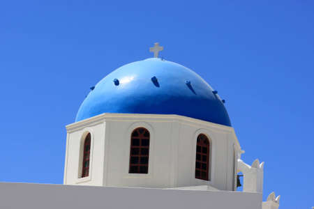 Blue cupola of greek orthodox church at Santorini, Oiaの写真素材