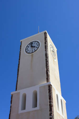 These is clock tower in Oia, Santorini island, Greeceの写真素材