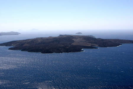View on island at Mediterranean Sea from Santoriniの写真素材
