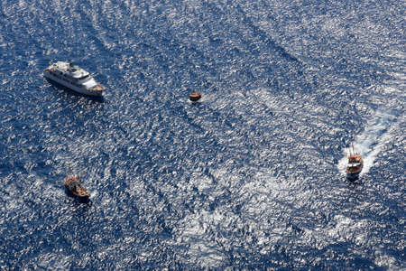 Three ships are at Mediterranean Sea, view from aboveの写真素材