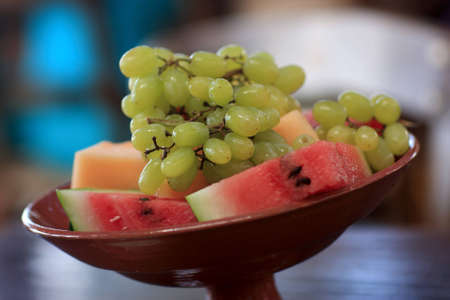 The grapes and watermelon at the restaurantの写真素材