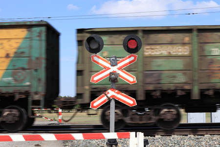 It is rail crossing and railroad carの写真素材