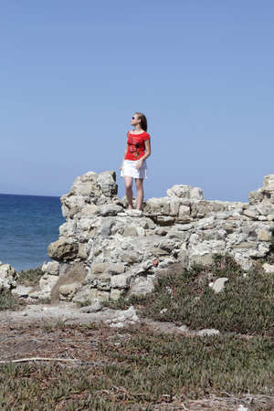 Portrait of a girl on a cliff, Rhodes, Greeceの写真素材