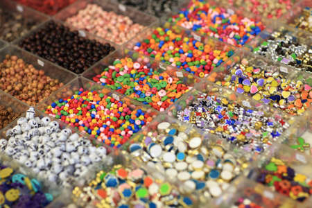 The materials for jewelry in the boxes at a market