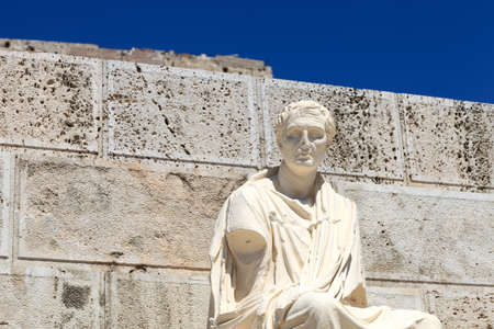 Statue of Menander on the wall backgroundの写真素材