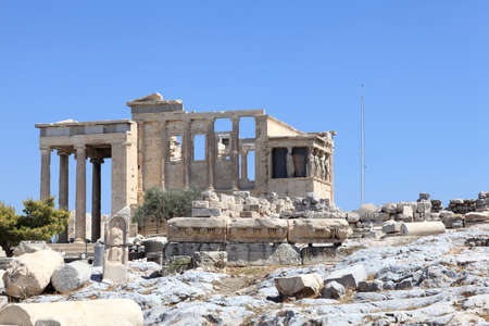 Erechtheum temple at acropolis of Athens in summer, Greeceの写真素材