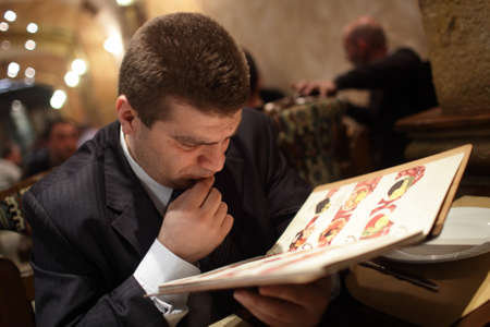 Man is choosing food in an armenian restaurantの写真素材