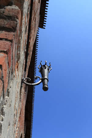 Torch holder on the wall of Kolomna Kremlin in Russiaの写真素材