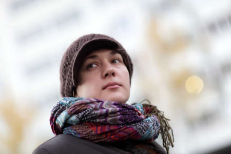 Woman in a knitted cap outdoor in autumnの写真素材