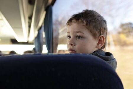 Portrait of a child in the busの写真素材
