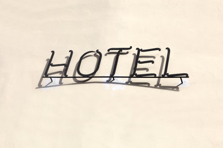 The hotel signboard on a brown wallのeditorial素材