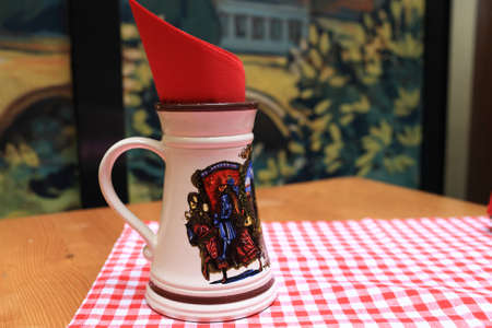 Red napkin in the glass at czech restaurantの写真素材