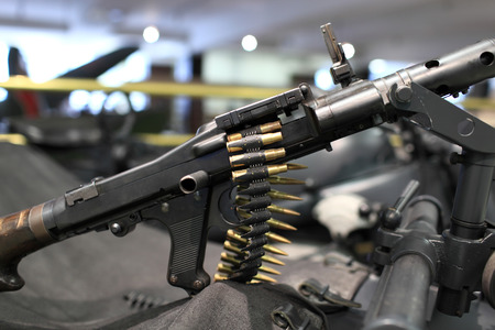 Details of the gun with machine-gun belt